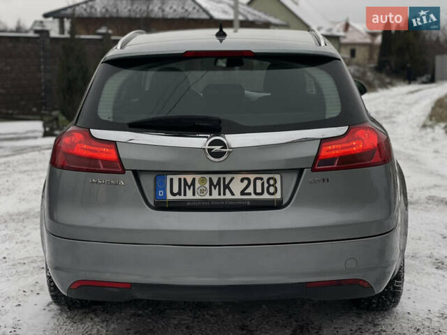Серый Опель Инсигния, объемом двигателя 2 л и пробегом 219 тыс. км за 7650 $, фото 6 на Automoto.ua