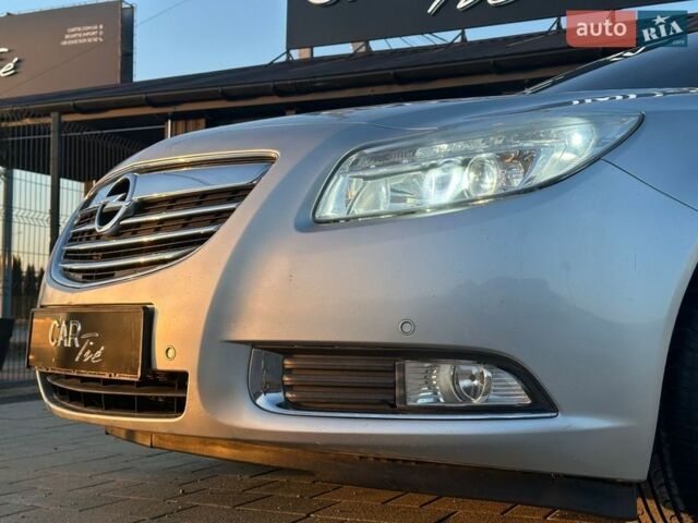 Сірий Опель Інсігнія, об'ємом двигуна 2 л та пробігом 325 тис. км за 7300 $, фото 4 на Automoto.ua