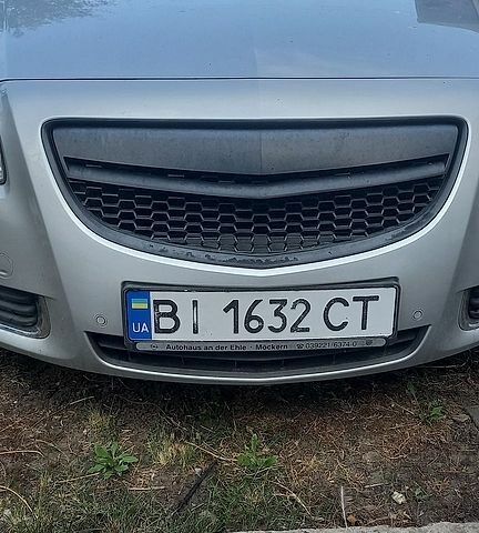 Серый Опель Инсигния, объемом двигателя 1.96 л и пробегом 264 тыс. км за 7500 $, фото 6 на Automoto.ua