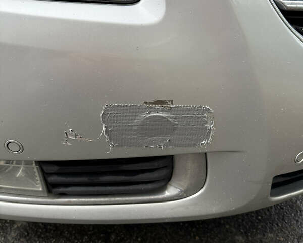 Серый Опель Инсигния, объемом двигателя 1.96 л и пробегом 303 тыс. км за 7400 $, фото 17 на Automoto.ua