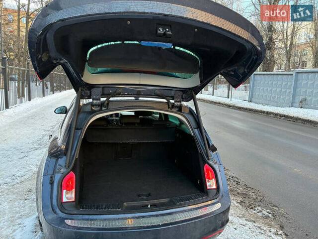 Серый Опель Инсигния, объемом двигателя 2 л и пробегом 325 тыс. км за 6340 $, фото 7 на Automoto.ua