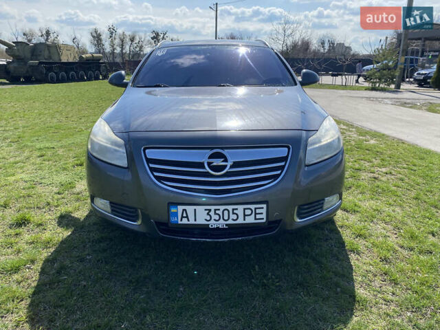 Серый Опель Инсигния, объемом двигателя 2 л и пробегом 396 тыс. км за 8350 $, фото 1 на Automoto.ua