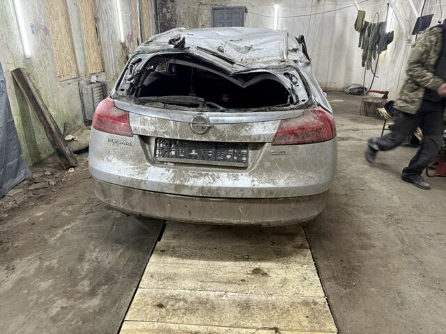 Серый Опель Инсигния, объемом двигателя 2 л и пробегом 312 тыс. км за 1800 $, фото 2 на Automoto.ua