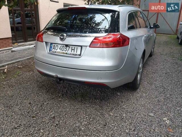 Серый Опель Инсигния, объемом двигателя 2 л и пробегом 234 тыс. км за 8300 $, фото 4 на Automoto.ua