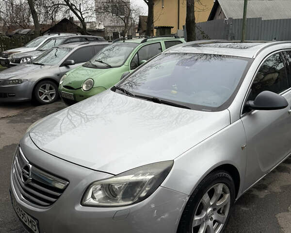 Серый Опель Инсигния, объемом двигателя 1.96 л и пробегом 303 тыс. км за 7400 $, фото 7 на Automoto.ua