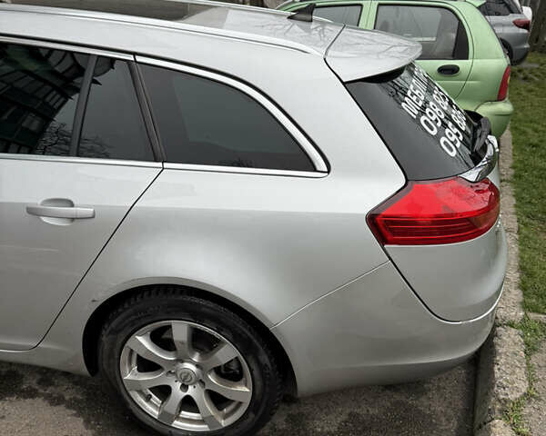 Серый Опель Инсигния, объемом двигателя 1.96 л и пробегом 303 тыс. км за 7400 $, фото 6 на Automoto.ua