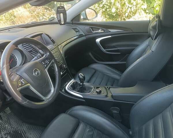 Серый Опель Инсигния, объемом двигателя 1.96 л и пробегом 340 тыс. км за 7200 $, фото 4 на Automoto.ua