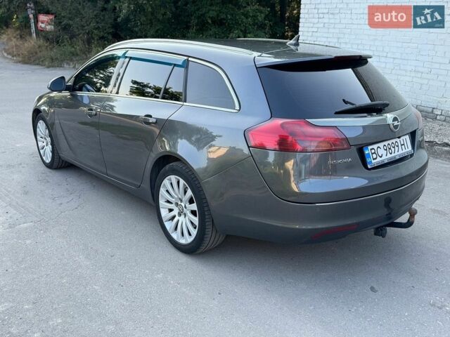 Сірий Опель Інсігнія, об'ємом двигуна 1.96 л та пробігом 255 тис. км за 5999 $, фото 2 на Automoto.ua