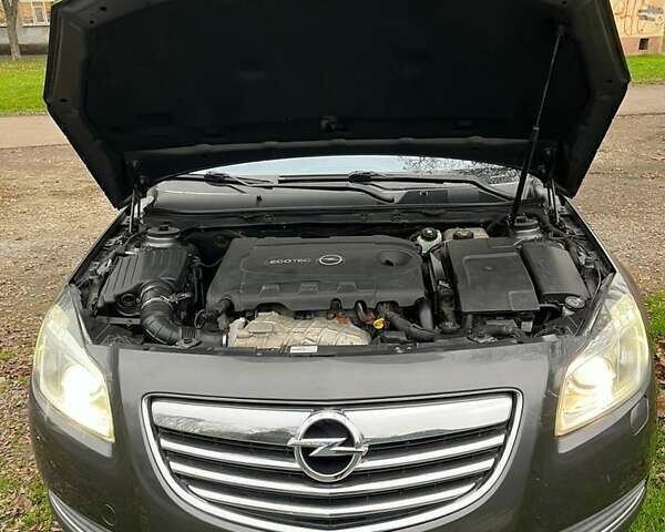 Серый Опель Инсигния, объемом двигателя 2 л и пробегом 299 тыс. км за 6700 $, фото 3 на Automoto.ua