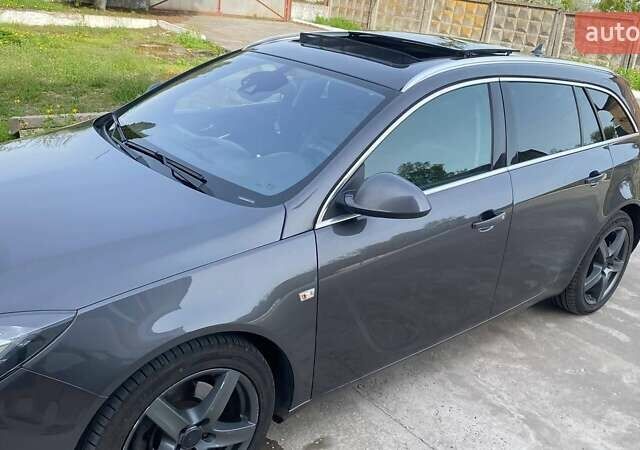 Сірий Опель Інсігнія, об'ємом двигуна 1.96 л та пробігом 221 тис. км за 12500 $, фото 1 на Automoto.ua