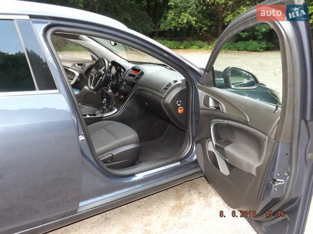 Серый Опель Инсигния, объемом двигателя 2 л и пробегом 320 тыс. км за 8600 $, фото 13 на Automoto.ua