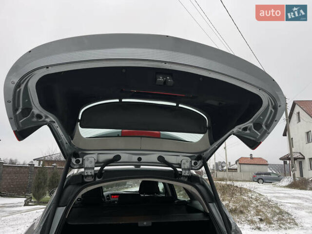 Серый Опель Инсигния, объемом двигателя 2 л и пробегом 219 тыс. км за 7650 $, фото 88 на Automoto.ua