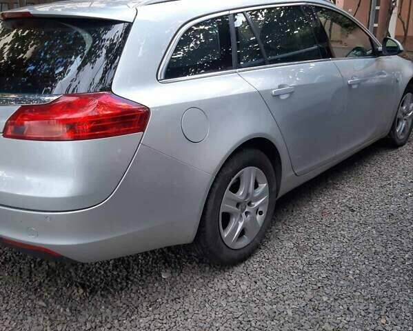 Серый Опель Инсигния, объемом двигателя 2 л и пробегом 234 тыс. км за 8300 $, фото 1 на Automoto.ua