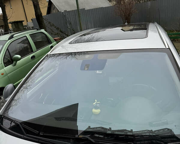 Серый Опель Инсигния, объемом двигателя 1.96 л и пробегом 303 тыс. км за 7400 $, фото 9 на Automoto.ua