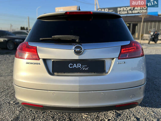 Серый Опель Инсигния, объемом двигателя 2 л и пробегом 323 тыс. км за 6900 $, фото 5 на Automoto.ua