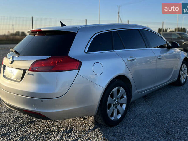 Серый Опель Инсигния, объемом двигателя 2 л и пробегом 323 тыс. км за 6900 $, фото 6 на Automoto.ua