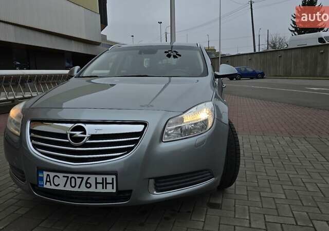 Серый Опель Инсигния, объемом двигателя 1.96 л и пробегом 235 тыс. км за 8000 $, фото 1 на Automoto.ua