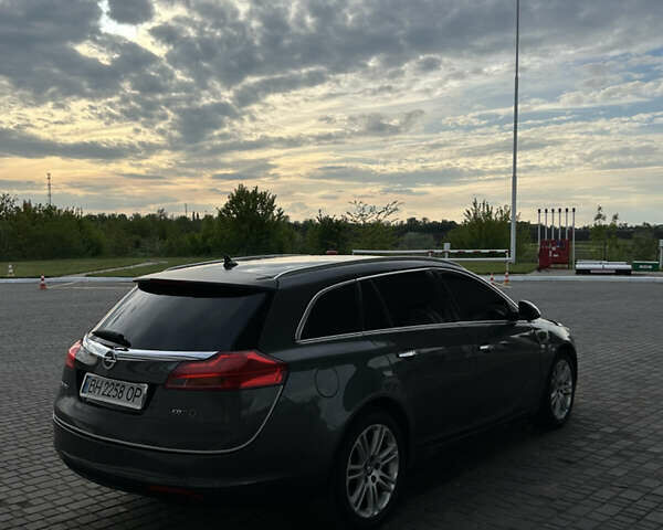 Сірий Опель Інсігнія, об'ємом двигуна 2 л та пробігом 256 тис. км за 7600 $, фото 5 на Automoto.ua