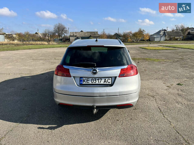 Серый Опель Инсигния, объемом двигателя 2 л и пробегом 287 тыс. км за 7400 $, фото 5 на Automoto.ua