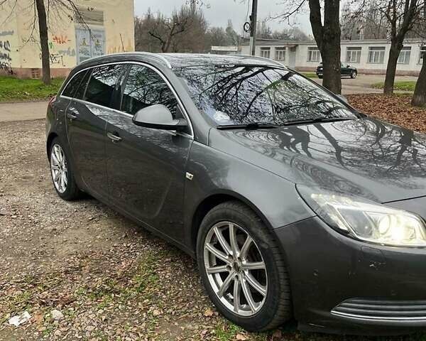 Серый Опель Инсигния, объемом двигателя 2 л и пробегом 299 тыс. км за 6700 $, фото 2 на Automoto.ua