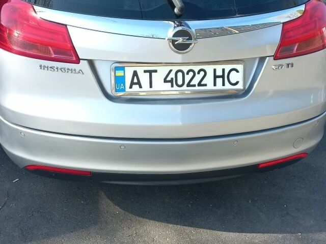 Серый Опель Инсигния, объемом двигателя 2 л и пробегом 219 тыс. км за 8199 $, фото 1 на Automoto.ua