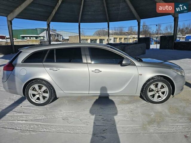 Сірий Опель Інсігнія, об'ємом двигуна 1.96 л та пробігом 254 тис. км за 7899 $, фото 3 на Automoto.ua