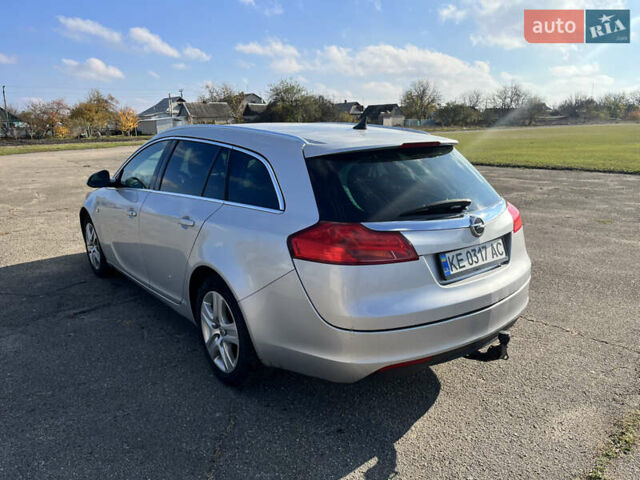 Серый Опель Инсигния, объемом двигателя 2 л и пробегом 287 тыс. км за 7400 $, фото 6 на Automoto.ua