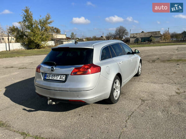 Серый Опель Инсигния, объемом двигателя 2 л и пробегом 287 тыс. км за 7400 $, фото 4 на Automoto.ua