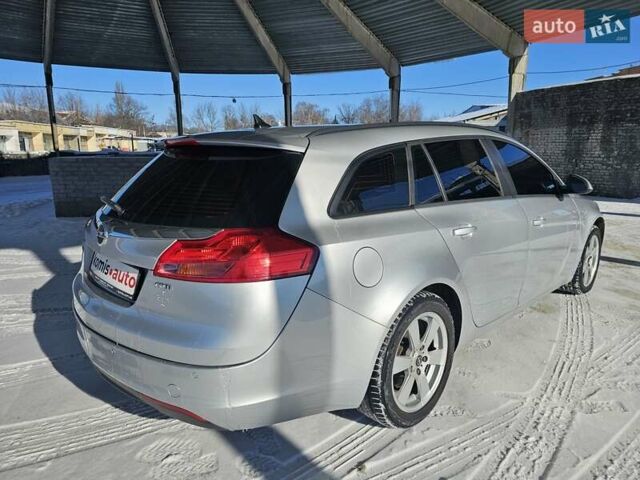 Сірий Опель Інсігнія, об'ємом двигуна 1.96 л та пробігом 254 тис. км за 7899 $, фото 4 на Automoto.ua