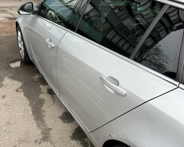 Серый Опель Инсигния, объемом двигателя 1.96 л и пробегом 303 тыс. км за 7400 $, фото 5 на Automoto.ua