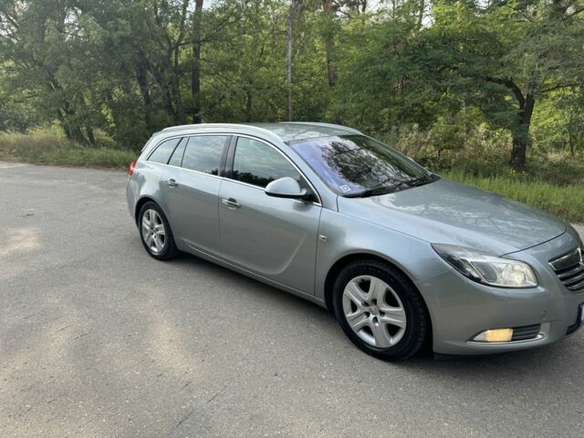 Серый Опель Инсигния, объемом двигателя 2 л и пробегом 166 тыс. км за 5600 $, фото 3 на Automoto.ua