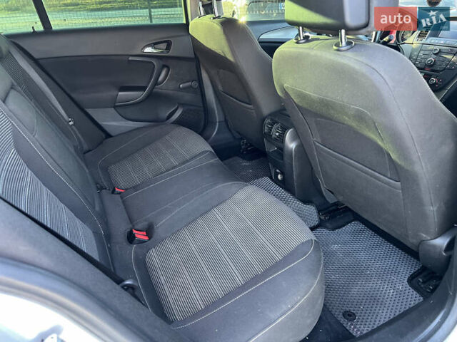 Серый Опель Инсигния, объемом двигателя 2 л и пробегом 323 тыс. км за 6900 $, фото 13 на Automoto.ua