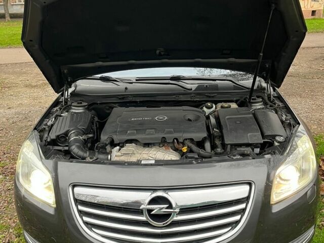 Серый Опель Инсигния, объемом двигателя 2 л и пробегом 299 тыс. км за 6700 $, фото 4 на Automoto.ua