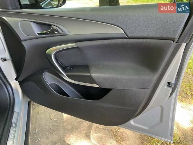 Сірий Опель Інсігнія, об'ємом двигуна 1.96 л та пробігом 313 тис. км за 6499 $, фото 12 на Automoto.ua