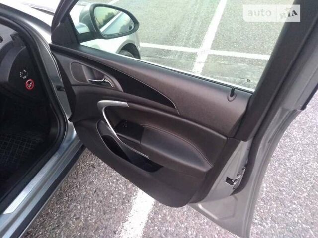 Серый Опель Инсигния, объемом двигателя 1.96 л и пробегом 370 тыс. км за 9000 $, фото 6 на Automoto.ua