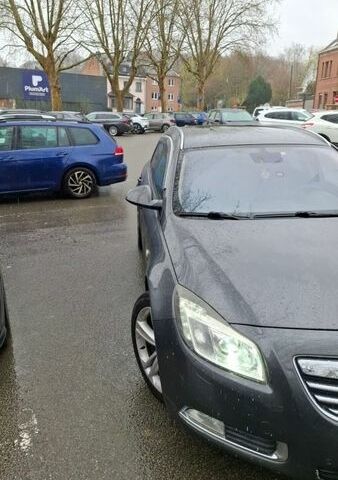 Серый Опель Инсигния, объемом двигателя 1.96 л и пробегом 324 тыс. км за 9000 $, фото 18 на Automoto.ua