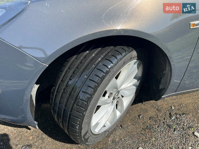 Серый Опель Инсигния, объемом двигателя 2 л и пробегом 213 тыс. км за 8950 $, фото 44 на Automoto.ua