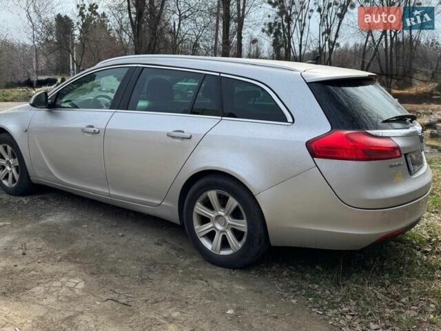 Серый Опель Инсигния, объемом двигателя 1.96 л и пробегом 220 тыс. км за 9000 $, фото 1 на Automoto.ua