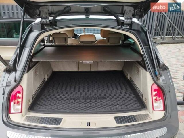 Серый Опель Инсигния, объемом двигателя 2 л и пробегом 293 тыс. км за 9500 $, фото 9 на Automoto.ua