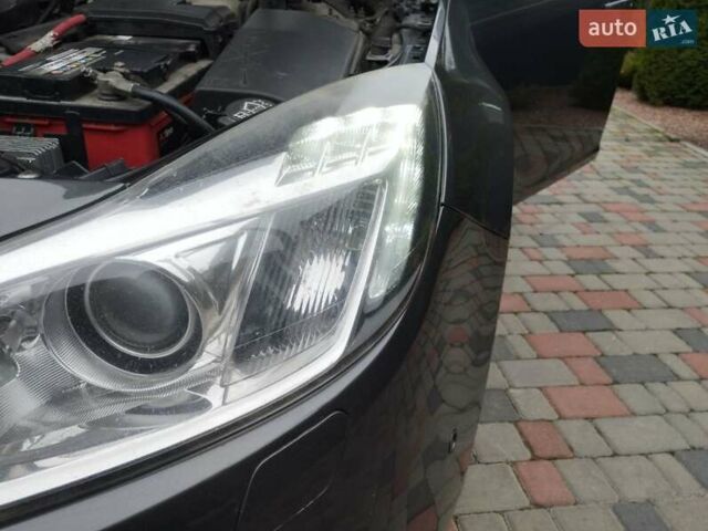 Серый Опель Инсигния, объемом двигателя 2 л и пробегом 293 тыс. км за 9500 $, фото 30 на Automoto.ua