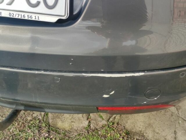 Серый Опель Инсигния, объемом двигателя 2 л и пробегом 450 тыс. км за 8000 $, фото 6 на Automoto.ua