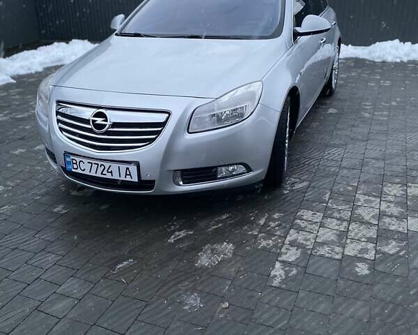 Сірий Опель Інсігнія, об'ємом двигуна 1.96 л та пробігом 220 тис. км за 7399 $, фото 3 на Automoto.ua