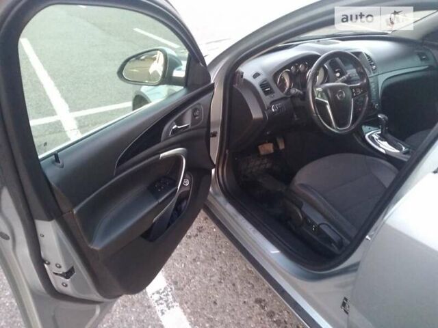 Серый Опель Инсигния, объемом двигателя 1.96 л и пробегом 370 тыс. км за 9000 $, фото 4 на Automoto.ua