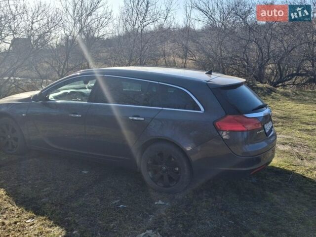 Серый Опель Инсигния, объемом двигателя 1.96 л и пробегом 185 тыс. км за 7000 $, фото 2 на Automoto.ua