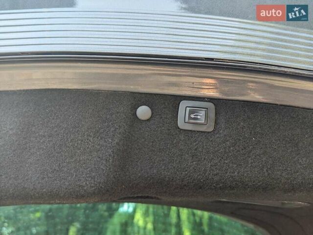 Сірий Опель Інсігнія, об'ємом двигуна 1.96 л та пробігом 225 тис. км за 9999 $, фото 12 на Automoto.ua