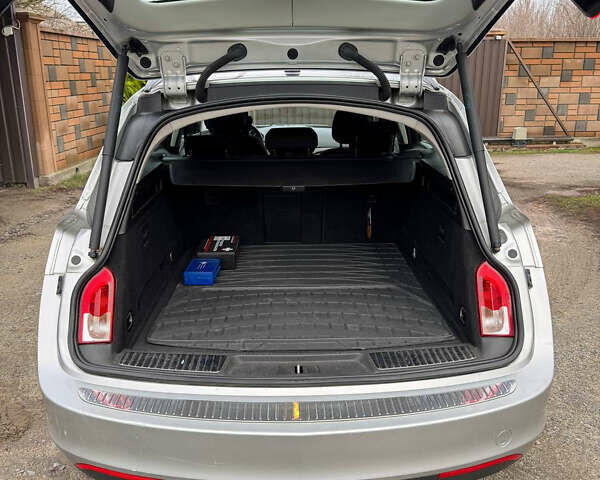 Серый Опель Инсигния, объемом двигателя 1.96 л и пробегом 234 тыс. км за 7700 $, фото 4 на Automoto.ua