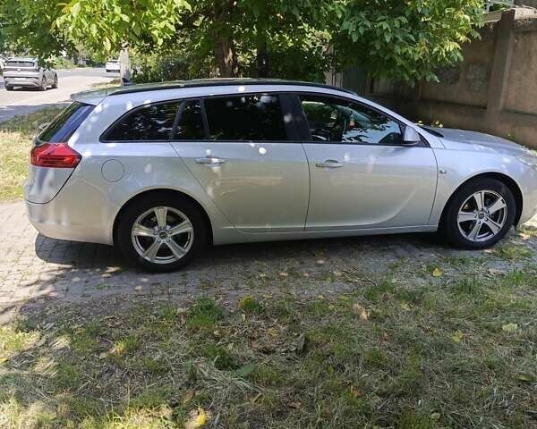 Серый Опель Инсигния, объемом двигателя 1.96 л и пробегом 286 тыс. км за 5300 $, фото 6 на Automoto.ua