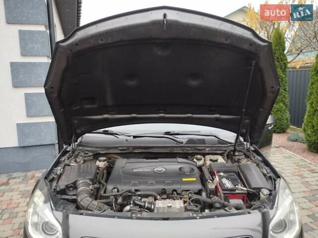 Серый Опель Инсигния, объемом двигателя 2 л и пробегом 293 тыс. км за 9500 $, фото 3 на Automoto.ua