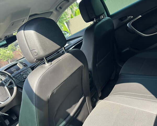 Серый Опель Инсигния, объемом двигателя 2 л и пробегом 213 тыс. км за 8950 $, фото 78 на Automoto.ua