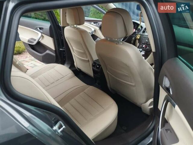 Серый Опель Инсигния, объемом двигателя 2 л и пробегом 293 тыс. км за 9500 $, фото 22 на Automoto.ua